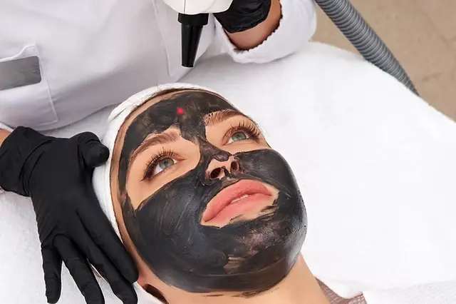 Client receiving a Black Diamond carbon laser facial at AV Glow Bar